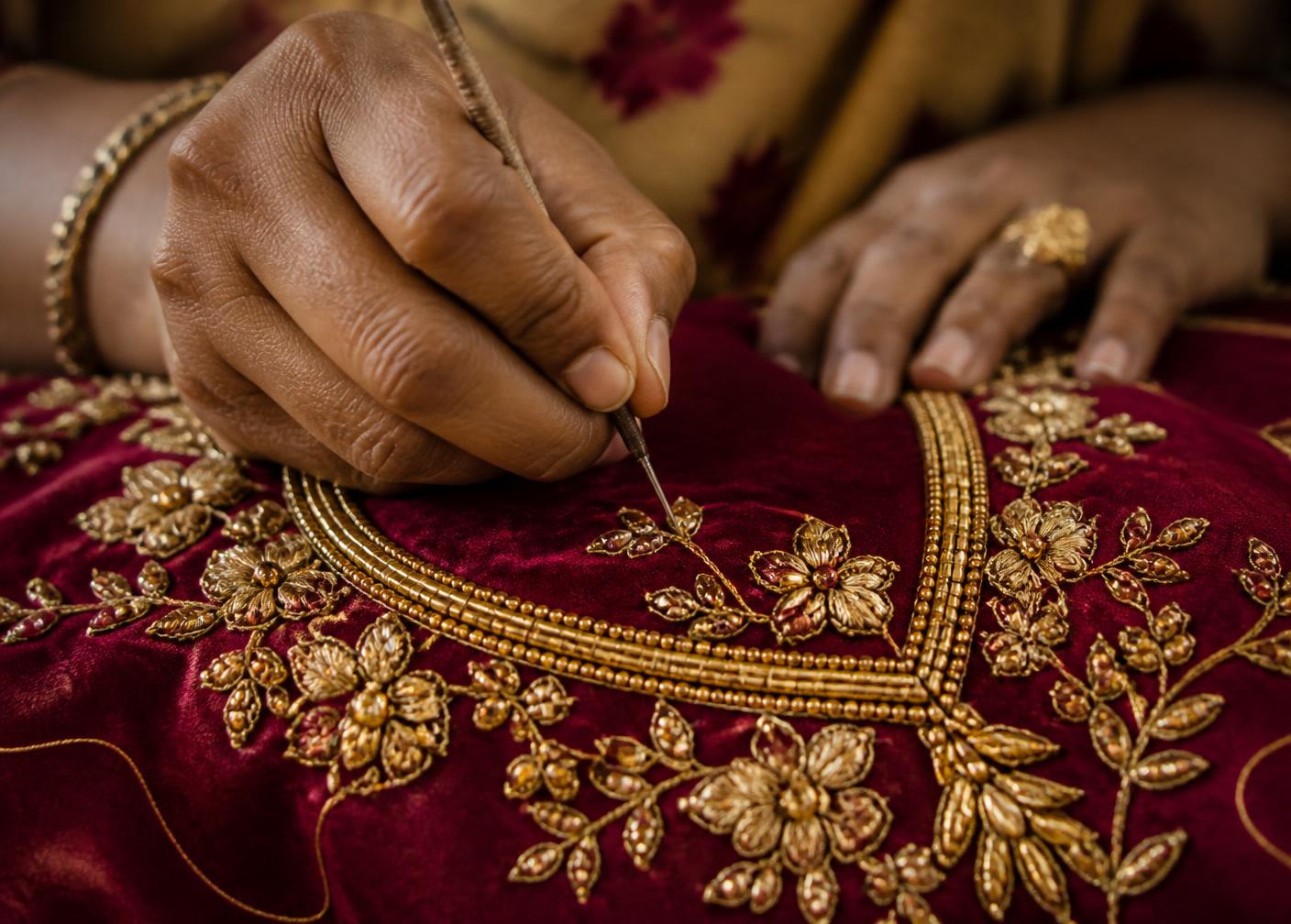 Gold hand embroidery on bridal fabric